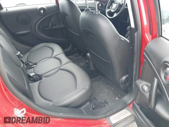 2013 MINI Countryman S with VIN WMWZC3C57DWP21892, listed as a IAAI auction lot 42402600 with 59,700 mi miles and . Bid and sale history available at DreamBid. Image 8.