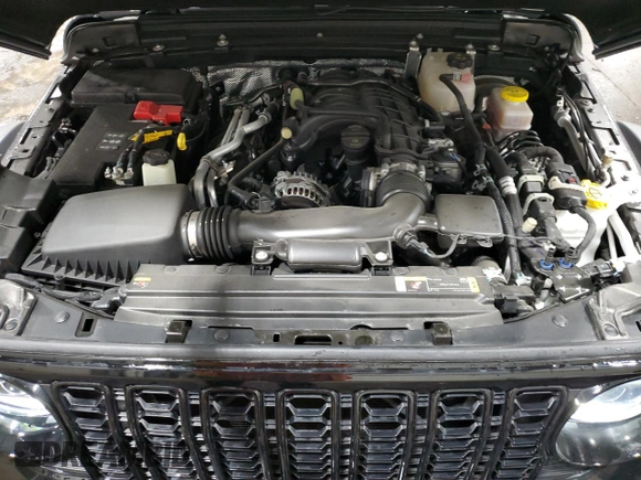 2024 Jeep Wrangler Willys with VIN 1C4PJXDG5RW312580, listed as a Copart auction lot 49144005 with 5,713 mi miles and Salvage Title. Bid and sale history available at carsss.com. Image 12.