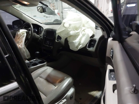 2013 Dodge Durango Crew with VIN 1C4SDJDT9DC670738, listed as a IAAI auction lot 41329419 with 149,520 mi miles and . Bid and sale history available at DreamBid. Image 5.