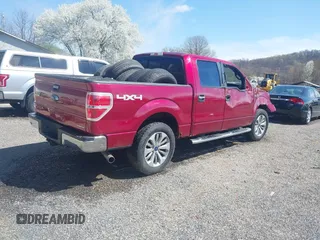 2014 Ford F-150 XL with VIN 1FTFW1EF8EFB27918, listed as a IAAI auction lot 41938587 with 129,508 mi miles. Bid and sale history available at carsss.com. Image 4.