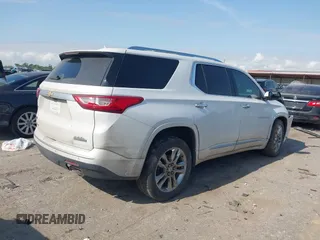 2020 Chevrolet Traverse High Country with VIN 1GNEVNKWXLJ135322, listed as a IAAI auction lot 42042466 with 105,748 mi miles and . Bid and sale history available at DreamBid. Image 4.