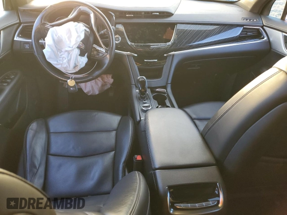 2023 Cadillac XT6 FWD Premium Luxury z VIN 1GYKPCRS7PZ105628, wystawiony jako Copart lot #84841124 z przebiegiem Nie podano mil oraz Szkoda całkowita • Salvage title. Historia ofert i sprzedaży dostępna na DreamBid. Obrazek 8.