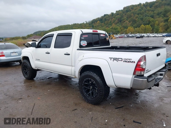 2014 Toyota Tacoma with VIN 3TMLU4EN9EM140999, listed as a IAAI auction lot 37765514 with 168,875 mi miles. Bid and sale history available at carsss.com. Image 3.
