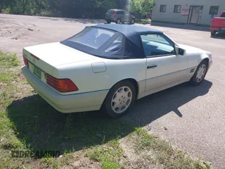 1994 Mercedes-Benz SL 5.0L z VIN WDBFA67E9RF096490, wystawiony jako IAAI lot #42377045 z przebiegiem 102 846 mil mil oraz . Historia ofert i sprzedaży dostępna na DreamBid. Obrazek 4.