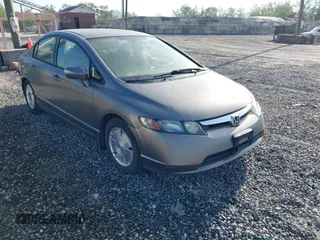 2006 Honda Civic z VIN JHMFA36206S009679, wystawiony jako IAAI lot #42117294 z przebiegiem 135 762 mil mil oraz . Historia ofert i sprzedaży dostępna na DreamBid. Obrazek 1.