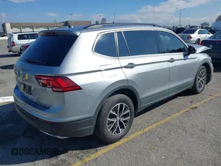 2021 Volkswagen Tiguan S with VIN 3VV1B7AX6MM131036, listed as a IAAI auction lot 41742604 with 55,155 mi miles and . Bid and sale history available at DreamBid. Image 4.