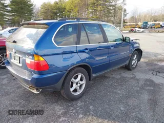 2001 BMW X5 4.4i with VIN WBAFB33501LH24719, listed as a IAAI auction lot 41055076 with 126,530 mi miles. Bid and sale history available at carsss.com. Image 4.