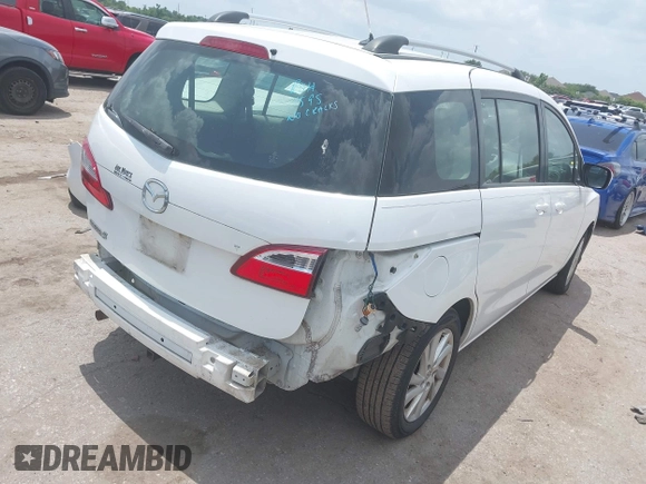 2012 Mazda 5 Sport with VIN JM1CW2BLXC0114770, listed as a IAAI auction lot 42147656 with 99,908 mi miles and . Bid and sale history available at DreamBid. Image 4.