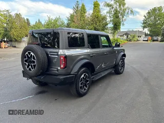 2022 Ford Bronco with VIN 1FMEE5DP5NLB24049, listed as a Copart auction lot 56769875 with 20,710 mi miles and Salvage Title. Bid and sale history available at DreamBid. Image 4.
