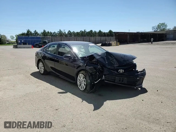 2023 Toyota Camry LE z VIN 4T1R11AK3PU776521, wystawiony jako Copart lot #55927255 z przebiegiem 50 323 mil mil oraz Szkoda całkowita • Salvage title. Historia ofert i sprzedaży dostępna na DreamBid. Obrazek 14.