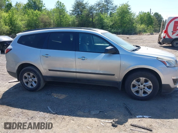 2015 Chevrolet Traverse LS z VIN 1GNKRFKD3FJ278483, wystawiony jako IAAI lot #42007507 z przebiegiem 147 938 mil mil oraz . Historia ofert i sprzedaży dostępna na DreamBid. Obrazek 13.