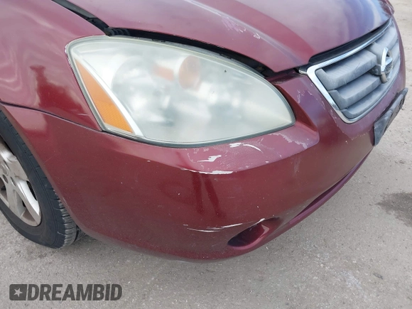 2002 Nissan Altima S with VIN 1N4AL11DX2C216559, listed as a IAAI auction lot 41540001 with 112,084 mi miles. Bid and sale history available at carsss.com. Image 14.