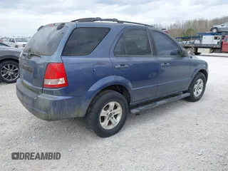2004 Kia Sorento LX with VIN KNDJC733545221418, listed as a IAAI auction lot 41842215 with 129,177 mi miles. Bid and sale history available at carsss.com. Image 4.