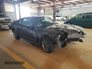 2003 Ford Mustang Standard with VIN 1FAFP40473F313652, listed as a Copart auction lot 57882105 with Not provided miles and Salvage title. Bid and sale history available at DreamBid. Image 4.