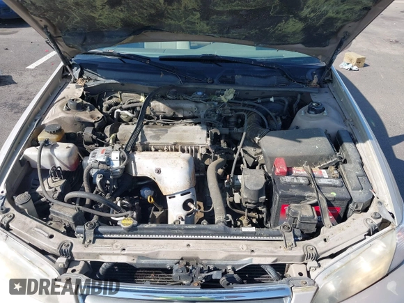 2000 Toyota Camry CE z VIN JT2BG22K2Y0440255, wystawiony jako IAAI lot #42088080 z przebiegiem 353 102 mil mil oraz . Historia ofert i sprzedaży dostępna na DreamBid. Obrazek 10.
