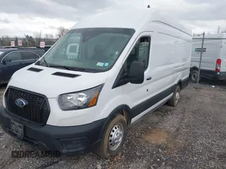 2023 Ford Transit Cargo with VIN 1FTBR3U89PKA07396, listed as a IAAI auction lot 41878907 with 103,402 mi miles and . Bid and sale history available at DreamBid. Image 16.