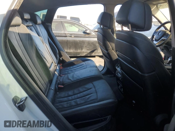 2016 BMW X6 sDrive35i with VIN 5UXKU0C56G0F92990, listed as a Copart auction lot 77191074 with 194,077 mi miles and Salvage Title. Bid and sale history available at carsss.com. Image 11.
