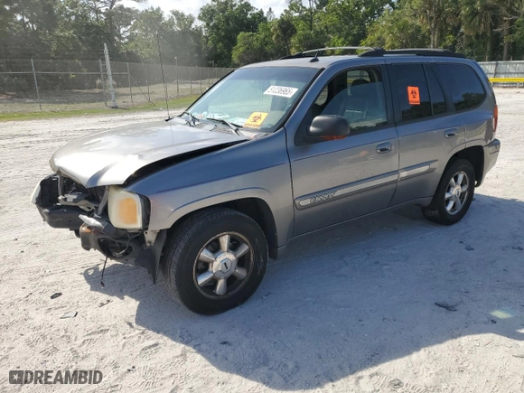 2005 GMC Envoy SLE with VIN 1GKDS13S752277744, listed as a Copart auction lot 51236965 with 248,950 mi miles and Salvage Title. Bid and sale history available at carsss.com. Image 1.