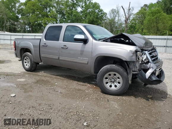 2013 GMC Sierra 1500 SLT with VIN 3GTP2WE79DG120737, listed as a Copart auction lot 51695995 with 118,809 mi miles and Salvage title. Bid and sale history available at DreamBid. Image 4.