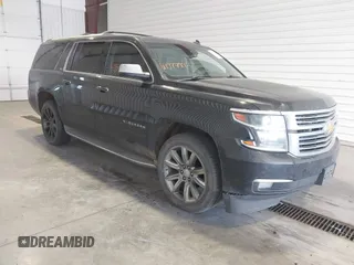 2015 Chevrolet Suburban LTZ with VIN 1GNSKKKC9FR151176, listed as a IAAI auction lot 41877892 with 233,363 mi miles. Bid and sale history available at carsss.com. Image 1.