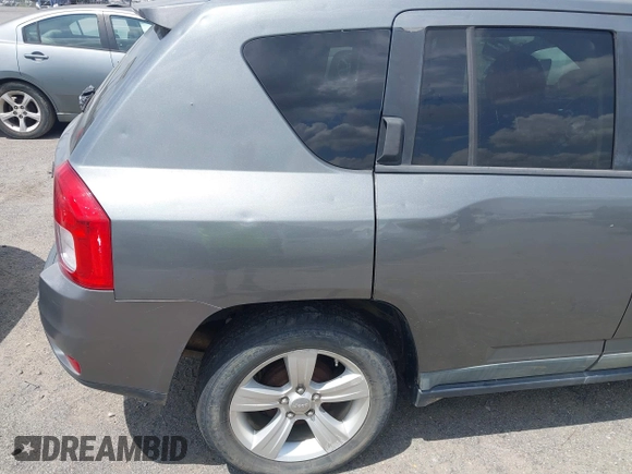 2011 Jeep Compass Latitude with VIN 1J4NT1FB4BD246549, listed as a IAAI auction lot 42156761 with 232,739 mi miles. Bid and sale history available at carsss.com. Image 14.