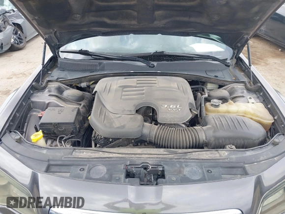2014 Chrysler 300 S with VIN 2C3CCAGG5EH201509, listed as a IAAI auction lot 42292680 with 162,674 mi miles and . Bid and sale history available at DreamBid. Image 10.