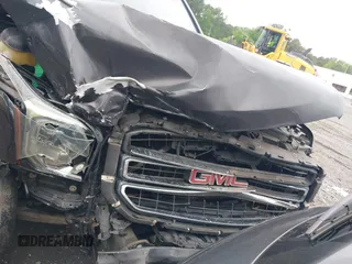 2015 GMC Yukon XL SLE z VIN 1GKS1GKC8FR507436, wystawiony jako IAAI lot #42113696 z przebiegiem Nie podano mil oraz . Historia ofert i sprzedaży dostępna na DreamBid. Obrazek 6.