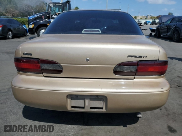 1997 Geo Prizm LSi z VIN 1Y1SK5263VZ408119, wystawiony jako Copart lot #52308235 z przebiegiem 344 971 mil mil oraz Szkody całkowita. Historia ofert i sprzedaży dostępna na DreamBid. Obrazek 6.