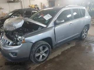 2016 Jeep Compass High Altitude Edition with VIN 1C4NJCEA2GD720148, listed as a IAAI auction lot 41689653 with 97,400 mi miles. Bid and sale history available at carsss.com. Image 2.