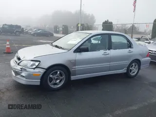 2002 Mitsubishi Lancer OZ-Rally with VIN JA3AJ86E92U038601, listed as a IAAI auction lot 41025991 with 162,450 mi miles. Bid and sale history available at carsss.com. Image 14.