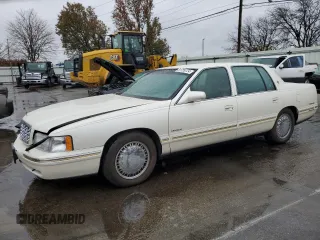 1997 Cadillac DeVille DHS z VIN 1G6KE54Y3VU291247, wystawiony jako Copart lot #81789724 z przebiegiem 105 212 mil mil oraz Szkoda całkowita • Salvage title. Historia ofert i sprzedaży dostępna na DreamBid. Obrazek 1.