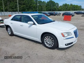 2013 Chrysler 300 with VIN 2C3CCAAG5DH740090, listed as a IAAI auction lot 42629393 with 161,460 mi miles and . Bid and sale history available at DreamBid. Image 1.