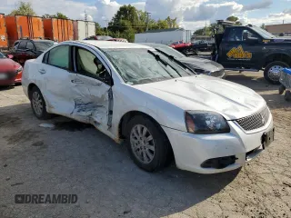 2011 Mitsubishi Galant FE z VIN 4A32B2FF4BE019728, wystawiony jako Copart lot #73040864 z przebiegiem 172 136 mil mil oraz Szkoda całkowita • Salvage title. Historia ofert i sprzedaży dostępna na DreamBid. Obrazek 4.