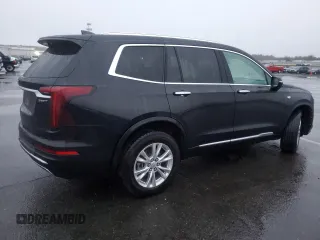 2023 Cadillac XT6 AWD Luxury z VIN 1GYKPBR41PZ110836, wystawiony jako Copart lot #84441314 z przebiegiem 77 023 mil mil oraz Szkoda całkowita • Salvage title. Historia ofert i sprzedaży dostępna na DreamBid. Obrazek 3.