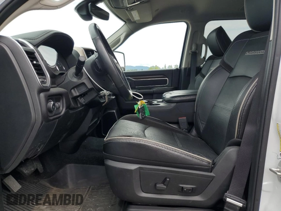 2023 Ram 2500 Laramie with VIN 3C6UR5FJ1PG634158, listed as a Copart auction lot 57164505 with 18,279 mi miles and Salvage title. Bid and sale history available at DreamBid. Image 7.