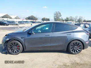 2023 Tesla Model Y Performance with VIN 7SAYGDEF5PF823122, listed as a IAAI auction lot 41546480 with 12,943 mi miles and . Bid and sale history available at DreamBid. Image 13.