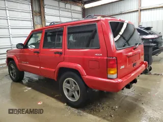 2001 Jeep Cherokee Sport with VIN 1J4FF58S01L519670, listed as a Copart auction lot 84340454 with 132,584 mi miles and Clean title. Bid and sale history available at DreamBid. Image 2.