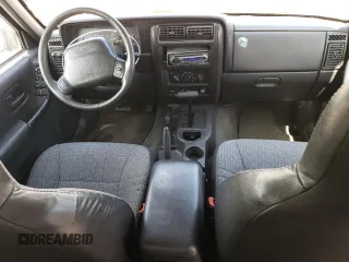 1999 Jeep Cherokee Sport z VIN 1J4FF68S8XL604061, wystawiony jako Copart lot #53175345 z przebiegiem 206 698 mil mil oraz Nie do naprawy • Non repairable. Historia ofert i sprzedaży dostępna na DreamBid. Obrazek 8.