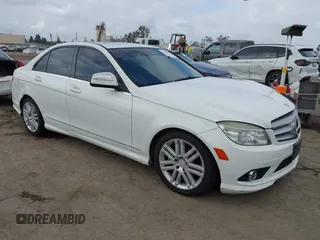 2009 Mercedes-Benz C-Class 3.0L Sport with VIN WDDGF54X39R050407, listed as a IAAI auction lot 42105946 with 197,471 mi miles. Bid and sale history available at carsss.com. Image 1.