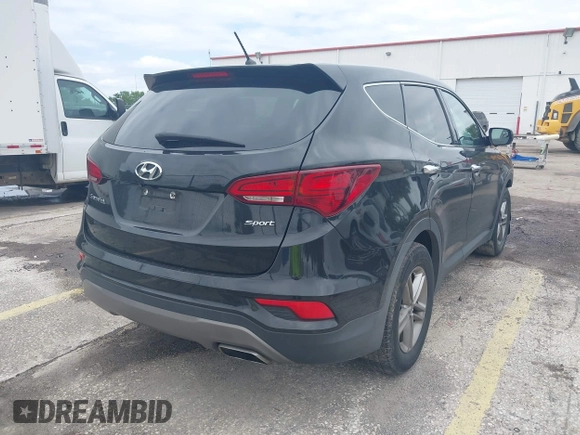 2018 Hyundai Santa Fe 2.4L with VIN 5XYZT3LB5JG539917, listed as a IAAI auction lot 41975300 with 214,562 mi miles and . Bid and sale history available at DreamBid. Image 4.