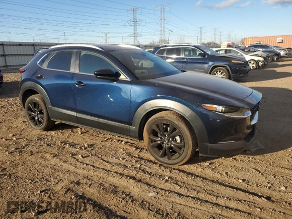 2022 Mazda CX-30 2.5 Turbo with VIN 3MVDMBAY8NM459690, listed as a Copart auction lot 84376874 with 24,723 mi miles and Salvage Title. Bid and sale history available at DreamBid. Image 4.