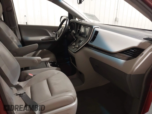 2015 Toyota Sienna XLE с VIN 5TDYK3DC5FS588258, выставлен на аукционе IAAI как лот 41089108 с пробегом 124 777 миль миль и . История ставок и продаж доступна на DreamBid. Изображение 5.
