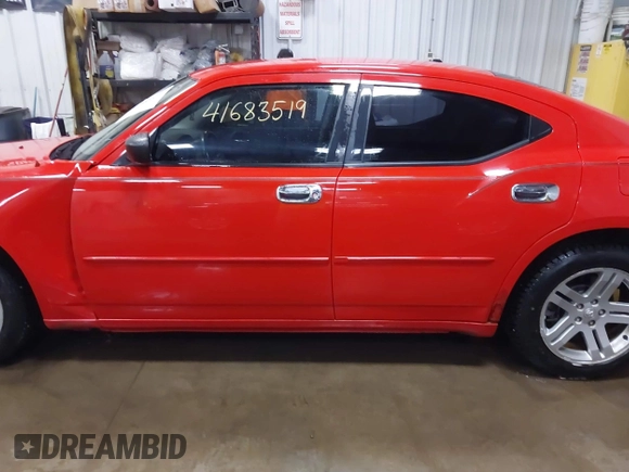 2007 Dodge Charger with VIN 2B3KA43G47H630570, listed as a IAAI auction lot 41683519 with 149,765 mi miles and . Bid and sale history available at DreamBid. Image 14.