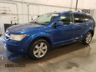 2010 Dodge Journey SXT with VIN 3D4PH5FV3AT227732, listed as a Copart auction lot 46987405 with 144,163 mi miles and Salvage Title. Bid and sale history available at carsss.com. Image 1.