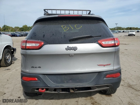 2015 Jeep Cherokee Trailhawk with VIN 1C4PJMBSXFW672073, listed as a Copart auction lot 71289874 with 999,999 mi miles and Clean Title. Bid and sale history available at carsss.com. Image 6.