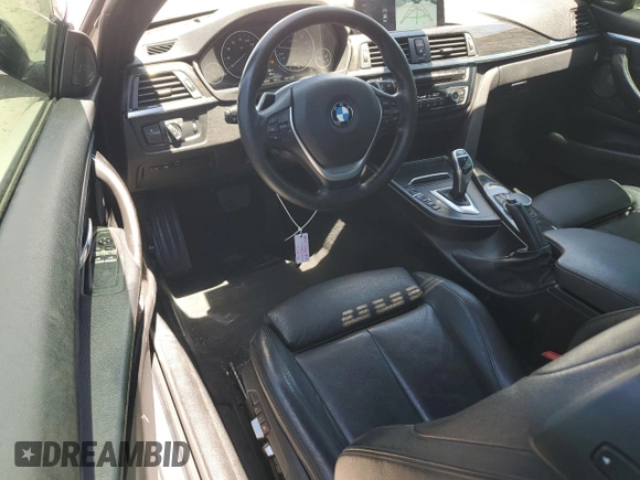 2017 BMW 4 Series 430i xDrive with VIN WBA4R9C3XHK878808, listed as a Copart auction lot 58300774 with 145,067 mi miles and Salvage Title. Bid and sale history available at DreamBid. Image 8.