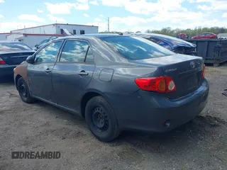 2010 Toyota Corolla with VIN 2T1BU4EE0AC521946, listed as a IAAI auction lot 42049301 with 169,807 mi miles. Bid and sale history available at carsss.com. Image 3.