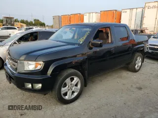 2010 Honda Ridgeline RTL with VIN 5FPYK1F52AB008326, listed as a Copart auction lot 71120074 with 157,688 mi miles and Salvage Title. Bid and sale history available at carsss.com. Image 1.