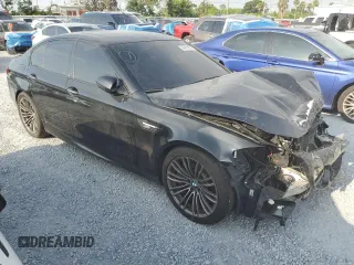 2014 BMW M5 z VIN WBSFV9C53ED594132, wystawiony jako Copart lot #56479355 z przebiegiem 89 020 mil mil oraz Szkody całkowita. Historia ofert i sprzedaży dostępna na DreamBid. Obrazek 4.