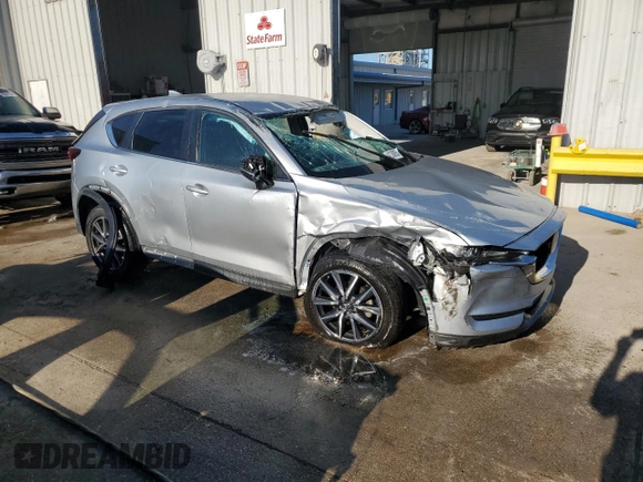 2018 Mazda CX-5 Touring with VIN JM3KFACM6J1431330, listed as a Copart auction lot 41338955 with 0 mi miles and Salvage Title. Bid and sale history available at carsss.com. Image 4.